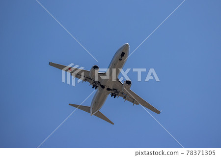 Passenger plane landing at Haneda Airport soon Passenger plane landing at Haneda Airport soon 78371305