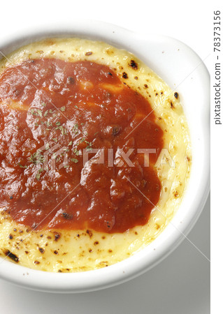 Photographed gratin, a hot doria with plenty of melted and browned cheese on a white background (overhead view) Photographed gratin, a hot doria with plenty of melted and browned cheese on a white background (overhead view) 78373156