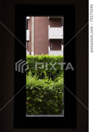 view of a building from a window in a residential building in parma, italy 78375040