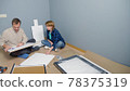 couple man and woman together install furniture in their apartment. 78375319