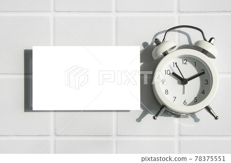 Clock and business card mockup on tile background 78375551