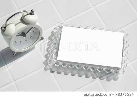 Clock and business card mockup on tile background Clock and business card mockup on tile background 78375554