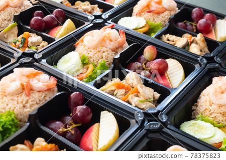 Thai food lunch boxes in plastic packages, Thai shrimp fried rice. Thai food lunch boxes in plastic packages, Thai shrimp fried rice. 78375823