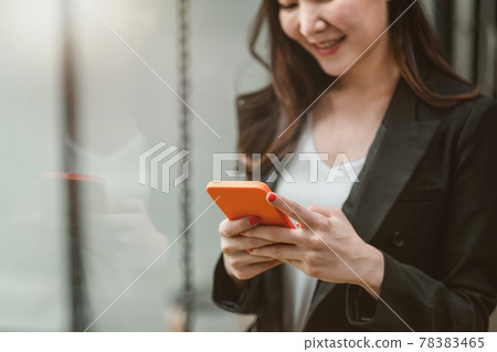 Business woman using smartphone shopping online, call, texting message internet technology lifestyle. Asian woman using cellphone at modern office 78383465