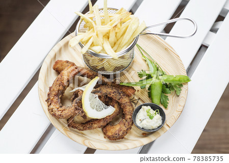 fried octpus rings calamari style with fries snack set fried octpus rings calamari style with fries snack set 78385735