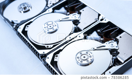 Close-up photo of a hard disk with a shell Close-up photo of a hard disk with a shell 78386285