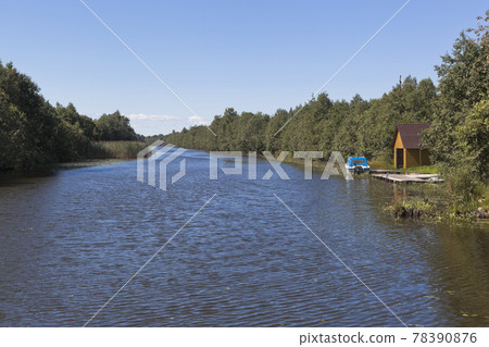 View from the Krohinskogo bridge on Belozersky bypass channel in the Vologda region View from the Krohinskogo bridge on Belozersky bypass channel in the Vologda region 78390876