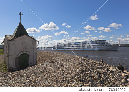 Passenger ship Maxim Litvinov passes near Goritsky Voskresensky monastery on the Sheksna River in Vologda Region, Russia Passenger ship Maxim Litvinov passes near Goritsky Voskresensky monastery on the Sheksna River in Vologda Region, Russia 78390922