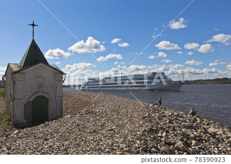 Passenger ship Maxim Litvinov passes near Goritsky Voskresensky monastery on the Sheksna River in Vologda Region Passenger ship Maxim Litvinov passes near Goritsky Voskresensky monastery on the Sheksna River in Vologda Region 78390923