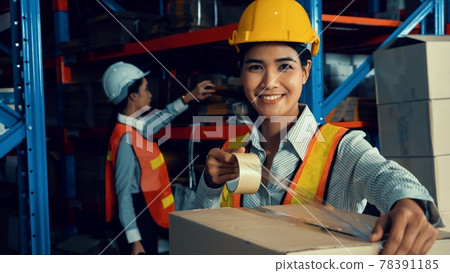 Portrait of young Asian woman warehouse worker smiling in the storehouse 78391185