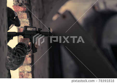 soldier training while playing paintball in the fortress 78391818