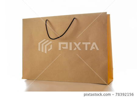 Brown paper bag texture. Kraft recycle package with empty blank space for design mockup isolated on white background. Delivery service concept. Copy space. Advertising area. 78392156