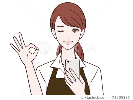 A cafe clerk holding a smartphone and making an OK mark 78395585