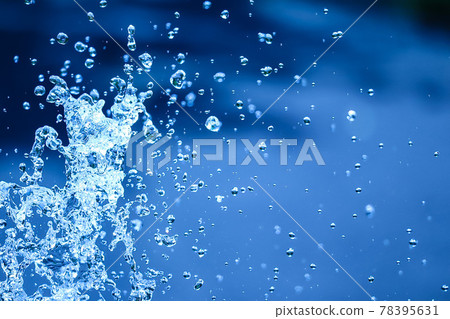 Splashes on a dark blue background 78395631