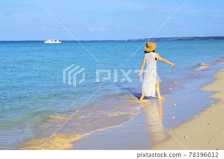One woman on the sea at tropical resort One woman on the sea at tropical resort 78396012