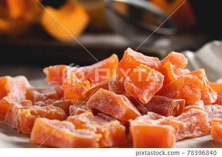Cooking Natural farm homemade candied pumpkin fruits sprinkled with powdered sugar 78396840