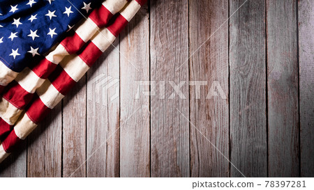 4th of July happy independence day concept. Vintage American flag on old wooden background. 4th of July happy independence day concept. Vintage American flag on old wooden background. 78397281