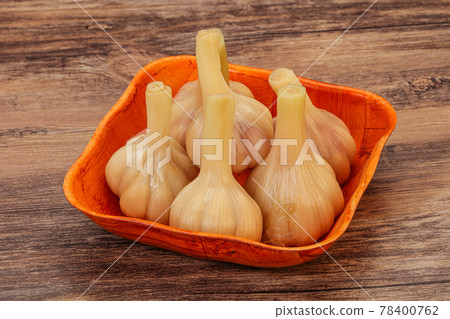 Marinated garlic in the bowl Marinated garlic in the bowl 78400762