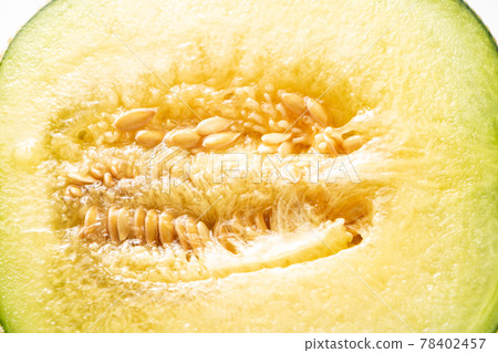 A cross section of a melon (Andean melon) cut in half. A cross section of a melon (Andean melon) cut in half. 78402457