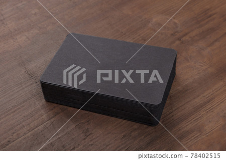 Black business cards mockup on a rustic background 78402515