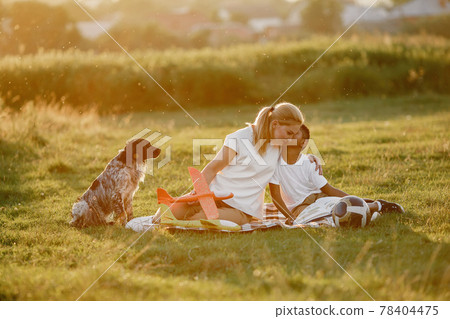 Multi-racial family playing in a summer park 78404475
