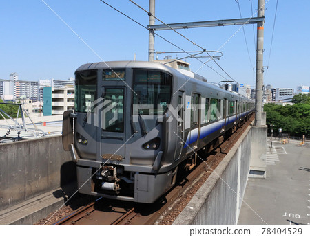 225 series rapid train passing through Imamiya Station on the loop line 225 series rapid train passing through Imamiya Station on the loop line 78404529
