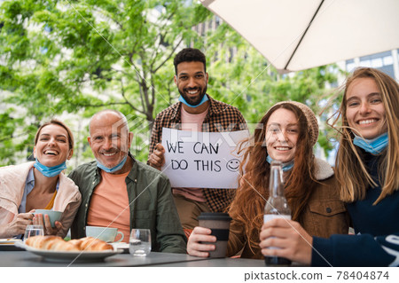 Reunion of family outdoors in city, life after covid-19 vaccination and back to normal concept. Reunion of family outdoors in city, life after covid-19 vaccination and back to normal concept. 78404874