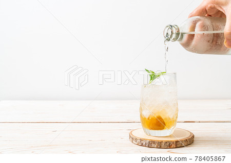 iced plum juice with soda and peppermint iced plum juice with soda and peppermint 78405867
