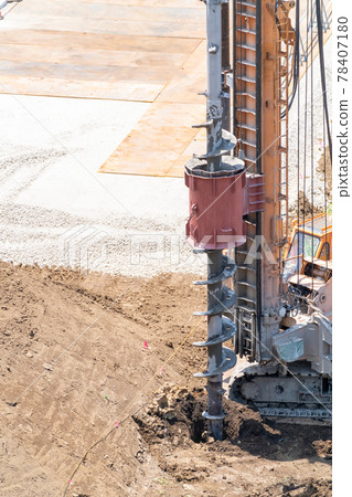 Construction site foundation work auger screw advance excavation 78407180