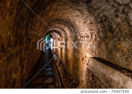 The cerezuelo river under the ruins of the church of Santa Maria, Cazorla, Spain 78407899