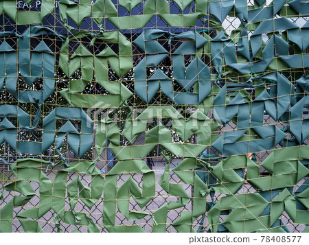 Green camouflage net close-up. Green camouflage net close-up. 78408577