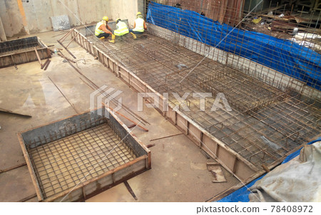 SELANGOR, MALAYSIA - JANUARY 15, 2017: Foundation work include the building piling works and pile cap construction at the construction site. Heavy construction work with full awareness about workers s 78408972