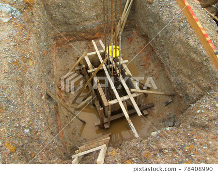 SELANGOR, MALAYSIA - JANUARY 15, 2017: Foundation work include the building piling works and pile cap construction at the construction site. Heavy construction work with full awareness about workers s SELANGOR, MALAYSIA - JANUARY 15, 2017: Foundation work include the building piling works and pile cap construction at the construction site. Heavy construction work with full awareness about workers s 78408990