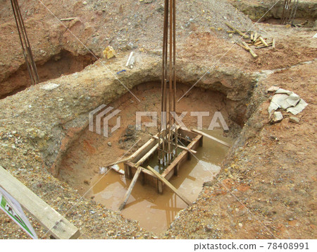 SELANGOR, MALAYSIA - JANUARY 15, 2017: Foundation work include the building piling works and pile cap construction at the construction site. Heavy construction work with full awareness about workers s SELANGOR, MALAYSIA - JANUARY 15, 2017: Foundation work include the building piling works and pile cap construction at the construction site. Heavy construction work with full awareness about workers s 78408991