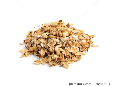 Pile of pistachios husks isolated on white background Pile of pistachios husks isolated on white background 78409801