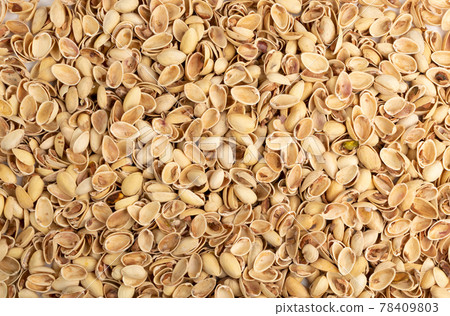 Pile of pistachios husks isolated on white background 78409803