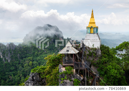 Whtie temple and pagoda on top of mountain in Thailand. Whtie temple and pagoda on top of mountain in Thailand. 78410869