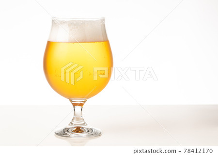 Glass of cold golden beer isolated on a white background 78412170