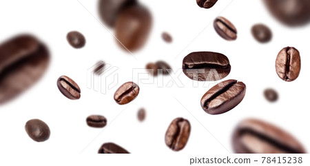 Brown roasted coffee beans flying on white background. Brown roasted coffee beans flying on white background. 78415238