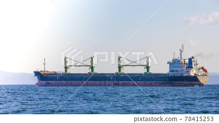close up bulk cargo ship to harbor quayside Vladivostok close up bulk cargo ship to harbor quayside Vladivostok 78415253