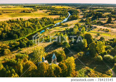 Martinovo, Beshenkovichsky District, Vitebsk Region, Belarus. Village Cityscape Skyline In Autumn Sunny Evening. Bird's-eye View Of Church Of The Intercession Of The Most Holy Theotokos. Aerial View 78415545