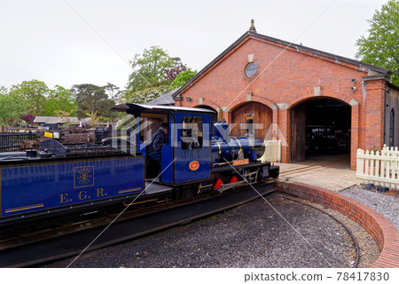 Miniature steam train at Exbury gardens - England UK Miniature steam train at Exbury gardens - England UK 78417830
