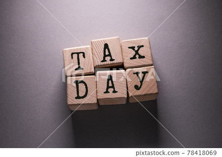 Tax Word with Wooden Cubes 78418069