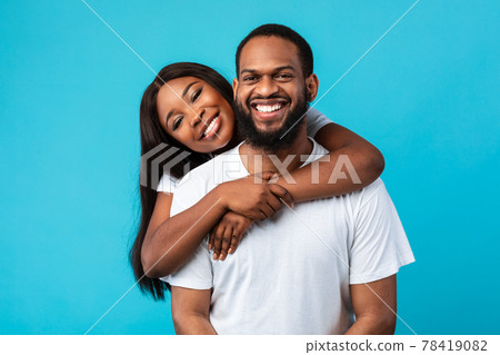 African American woman cuddling with her man 78419082