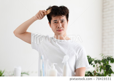 Worried about dandruff or hair loss, healthcare and beauty problems, routine at home 78419331