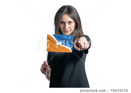 Happy young white woman holding flag of Argentine Antarctica and points forward in front of him isolated on a white background 78419570
