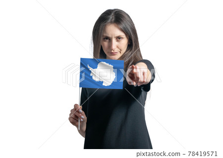 Happy young white woman holding flag of Antarctica and points forward in front of him isolated on a white background 78419571
