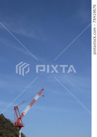 Japanese construction site crane and blue sky Japanese construction site crane and blue sky 78419676