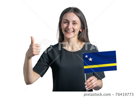 Happy young white woman holding flag of Curacao and shows the class by hand isolated on a white background Happy young white woman holding flag of Curacao and shows the class by hand isolated on a white background 78419773