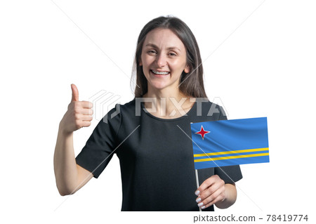 Happy young white woman holding flag of Aruba and shows the class by hand isolated on a white background Happy young white woman holding flag of Aruba and shows the class by hand isolated on a white background 78419774